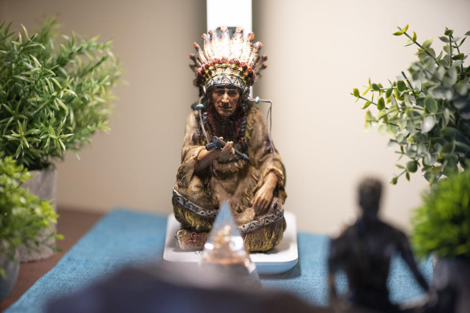 A Native American statue, one of his few personal possessions, sits on the side table in Alex Morisey's room at a nursing home, Wednesday, Feb. 15, 2023, in Philadelphia. For U.S. nursing home residents receiving Medicaid, all income is garnished and the person is left to rely on a small subsidy known as a personal needs allowance. The federal government hasn't changed the minimum rate, $30 monthly, since 1987. Pennsylvania’s allowance is $45. (AP Photo/Wong Maye-E)