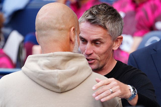 Ipswich manager Kieran McKenna and City's Pep Guardiola embrace