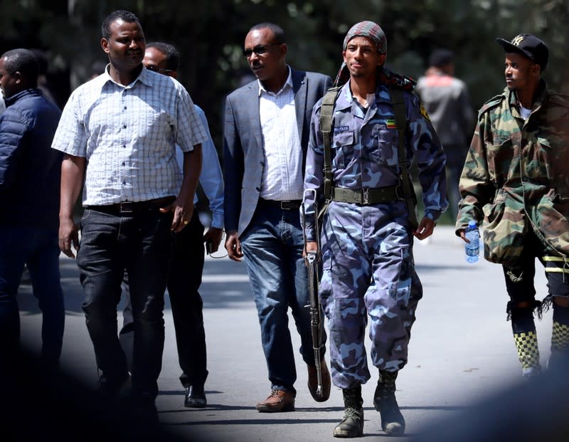 A federal police officer walks outside Jawar Mohammed's house, an Oromo activist and leader of the Oromo protest in Addis Ababa