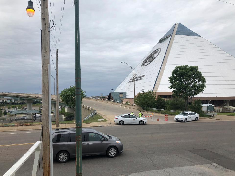 Transportation officers and police block an Interstate 40 onramp to the bridge over the Mississippi River near downtown Memphis, Tenn., on Tuesday, May 11, 2021.  (AP)