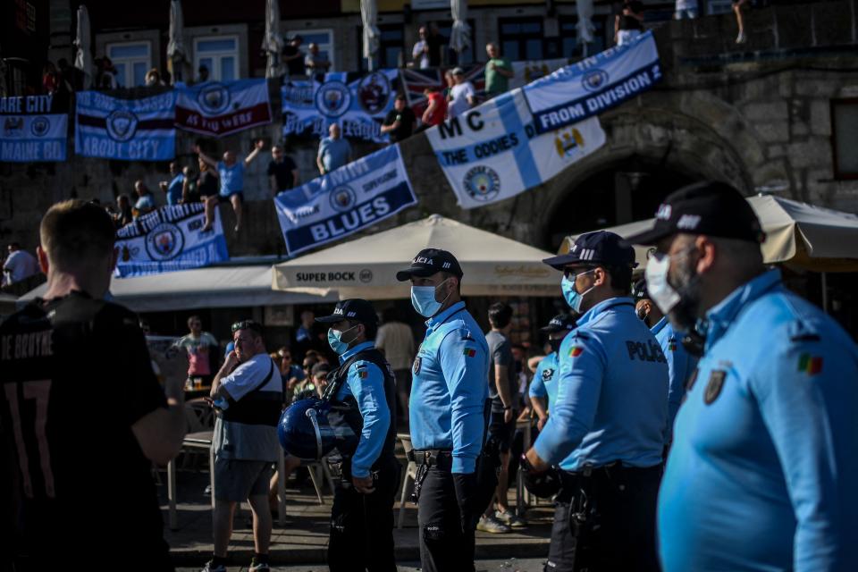 Local police keep an eye on English fans (AFP via Getty Images)