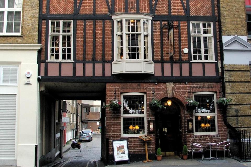 15. Bricklayers Arms: This fascinating Fitizrovia haunt, adorned with hanging baskets and flowers, is one of the cheapest spots for a drink in an otherwise very pricey area. It’s actually a little more upmarket than some other Sam Smith’s pubs, with the traditional dark wood fittings and etched glass. It is famously quiet, though, meaning it’s not always the best for atmosphere. <br></br>31 Gresse St, W1T 1QS (Chris Whippet/Creative Commons)