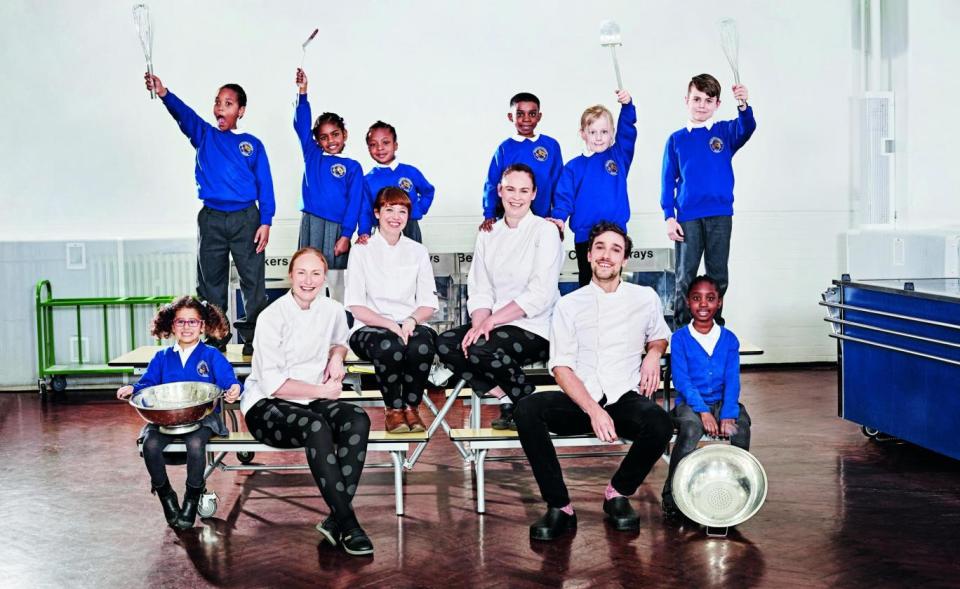 Children from Mandeville Primary School join chefs, from left, Angela Church, Nicole Pisani, Cheryl-Lynn Booth and Oliver Pagani at the school