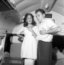 <p>Elizabeth Taylor adopted the combination of a pencil skirt and dress-like tunic as her maternity uniform.</p>