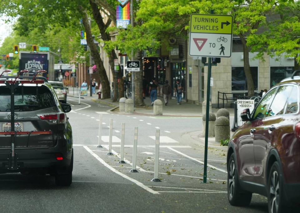 The city has installed traffic signals on Holly Street to help indicate the presence of bicyclists and pedestrians to drivers in downtown Bellingham, Washington.
