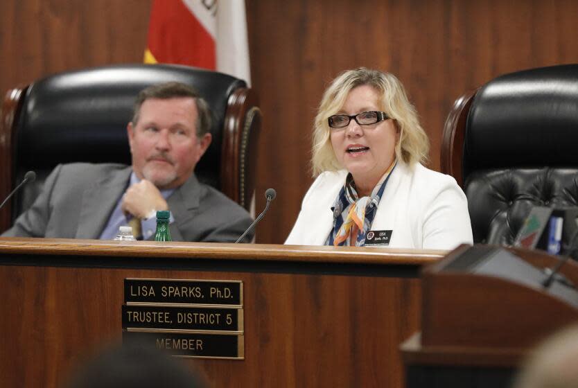 Trustee Lisa Sparks Ph.D, makes comments during the OC Board of Education's first of two controversial forums on ethnic studies and critical race theory as trustee and vic-president Ken Williams listens during their meeting on Tuesday.