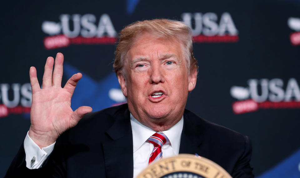 U.S. President Donald Trump gestures during a roundtable on tax cuts for Florida small businesses in Hialeah, Florida, U.S., April 16, 2018. REUTERS/Kevin Lamarque