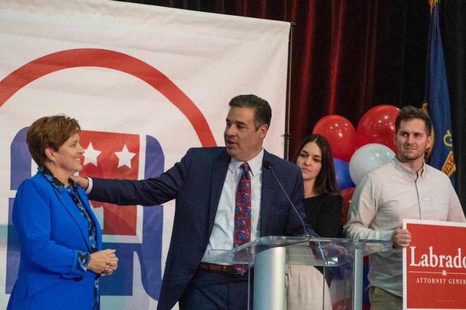 Republican Idaho Attorney General-elect Raúl Labrador speaks at the podium and acknowledges his wife, Rebecca Johnson, at left, at a watch party for Idaho Republican candidates at the Grove Hotel in Boise on Nov. 8.