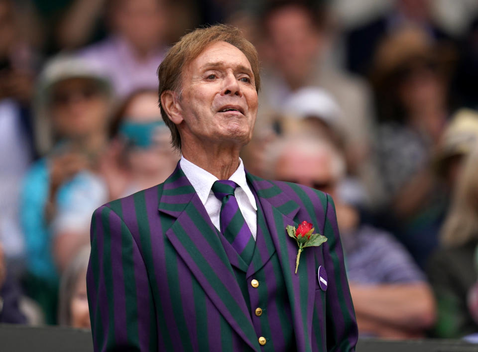 Sir Cliff Richard entertains the crowd on centre court during day seven of the 2022 Wimbledon Championships at the All England Lawn Tennis and Croquet Club, Wimbledon. Picture date: Sunday July 3, 2022.