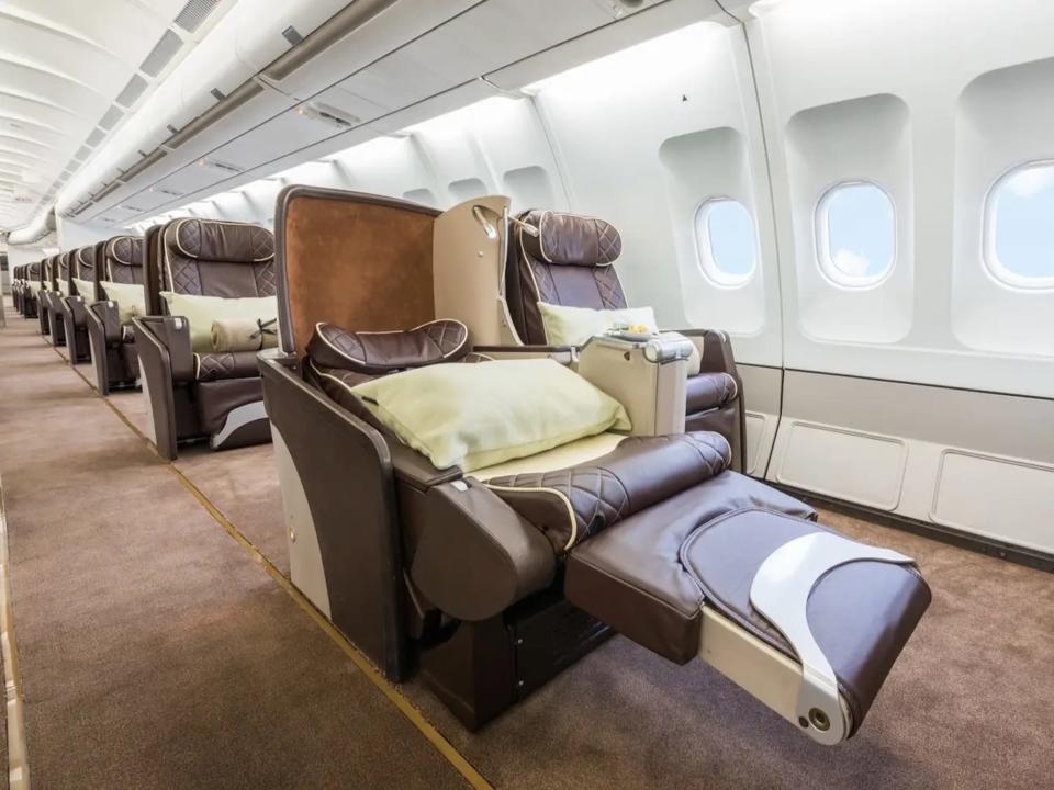 AirX Charters' A340 business class seat in lie-flat mode.