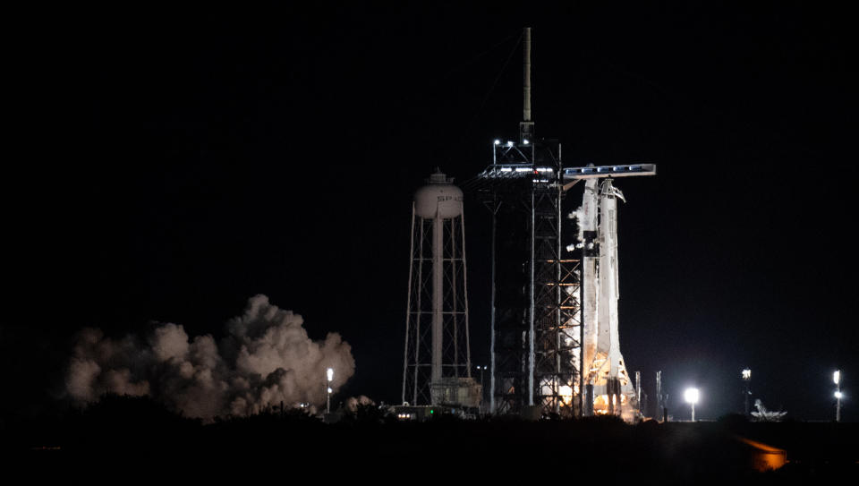 A SpaceX Falcon 9 rocket with the company's Crew Dragon spacecraft onboard is seen on the launch pad at Launch Complex 39A during a brief static fire test ahead of NASA’s SpaceX Crew-3 mission, Thursday, Oct. 28, 2021, at NASA’s Kennedy Space Center in Florida.