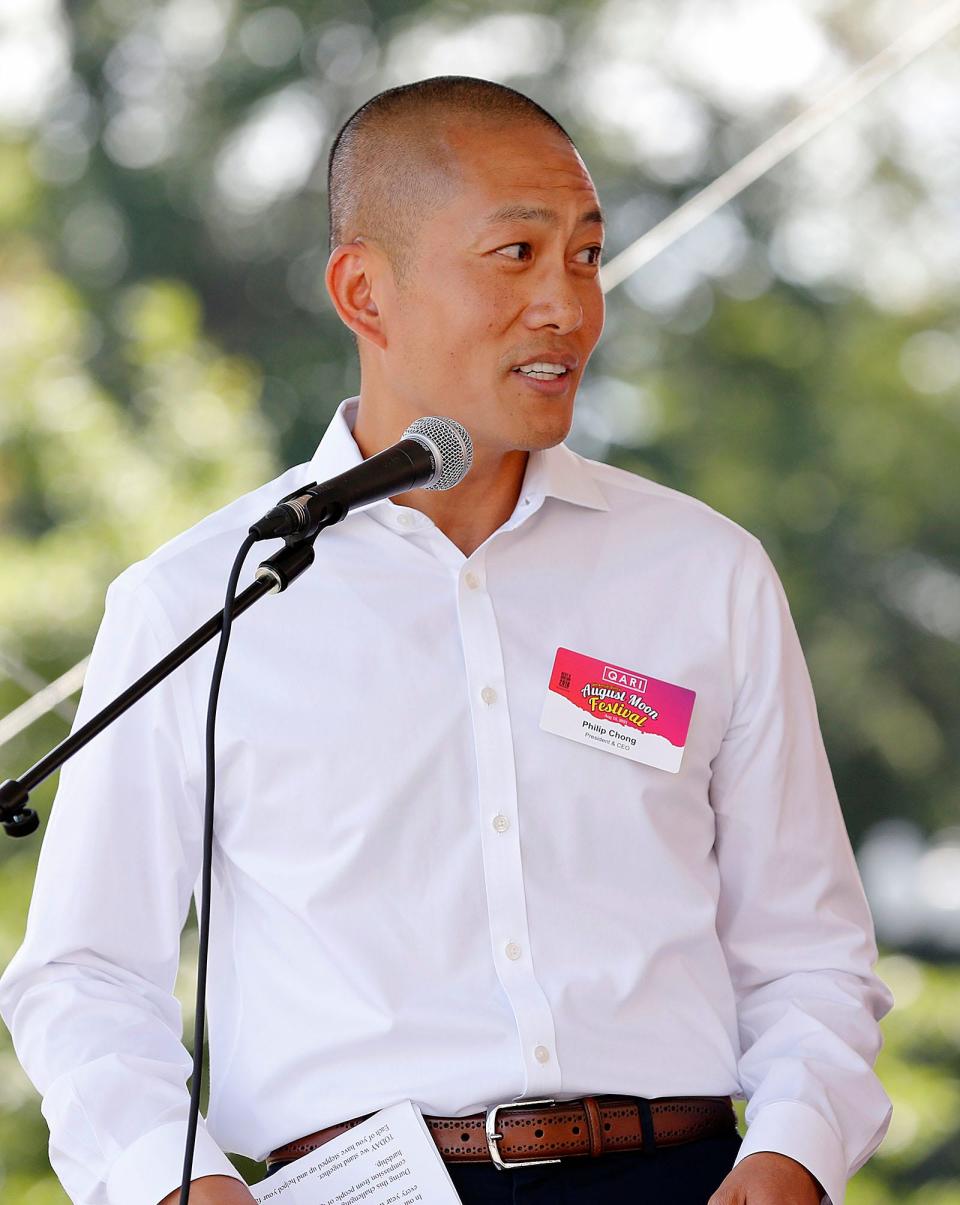 Quincy Asian Resources President Philip Chong thanks guests for coming to the annual August Moon Festival in Quincy on Sunday, Aug. 15, 2021.