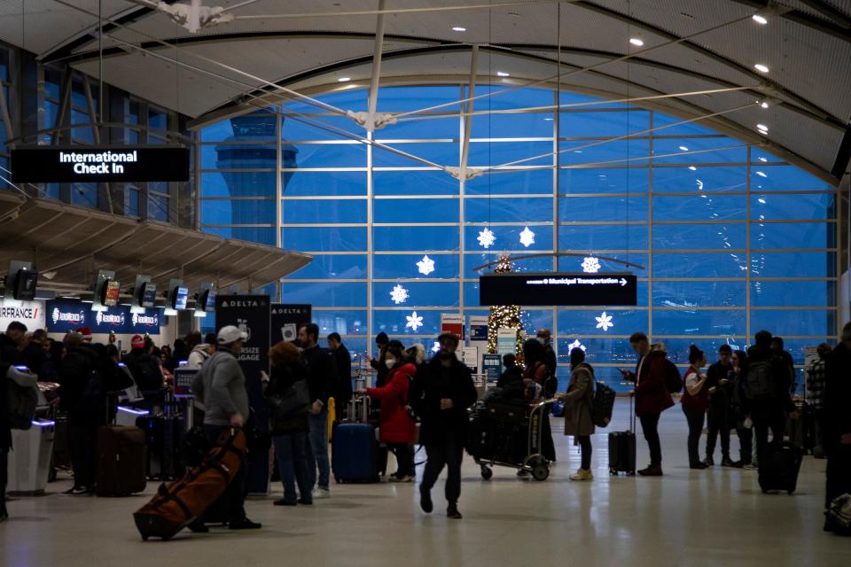 International check-in counters at the McNamara Terminal at Detroit Metro Airport in Romulus on Dec. 22, 2022.