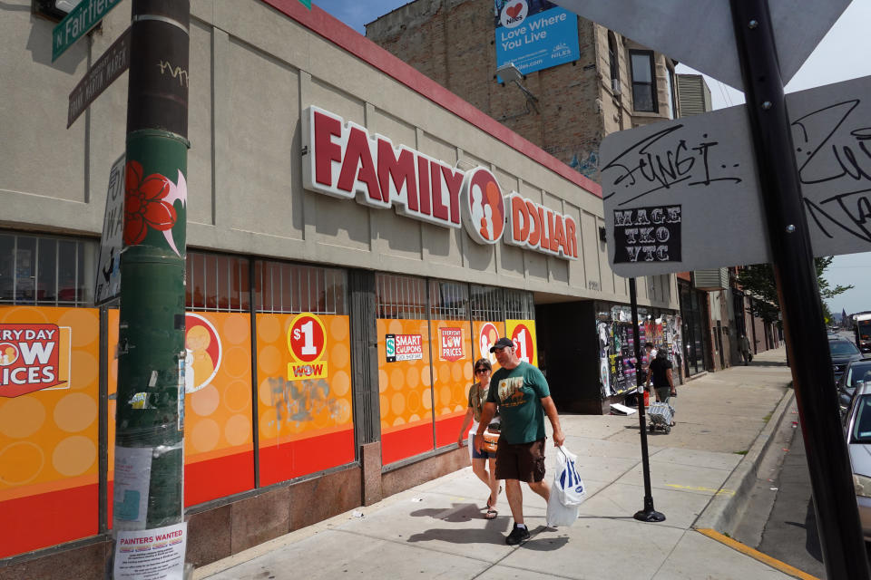 CHICAGO, IL - AUGUST 2: A pedestrian walks past a Family Dollar store in the Humboldt Park neighborhood on August 2, 2022 in Chicago, Illinois. Discount stores are seeing double-digit growth as higher-income shoppers turn to them as a hedge against inflation, which continues to whittle away at their purchasing power.  (Photo by Scott Olson/Getty Images)