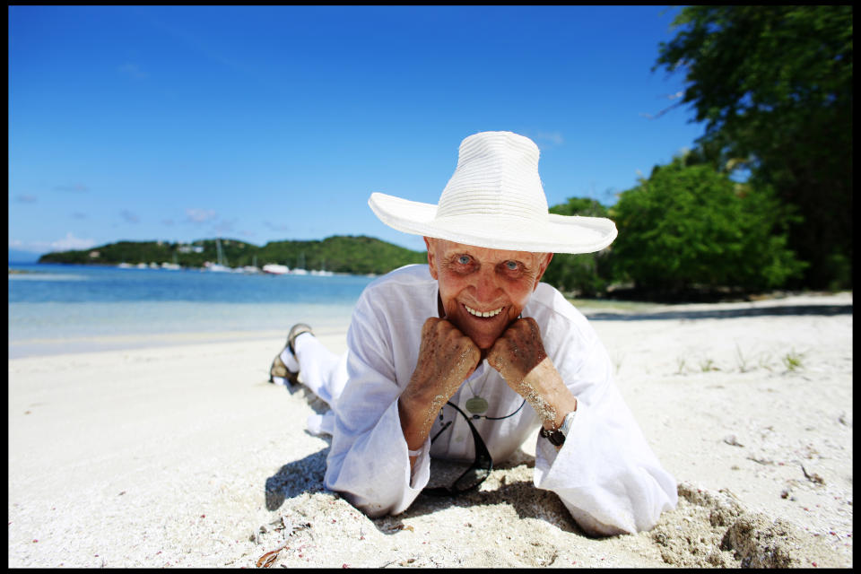 Lord Glenconner Colin Tennant, the founder of the island of Mustique, on a beach on the island. | Location: St.Lucia.  (Photo by David Howells/Corbis via Getty Images)