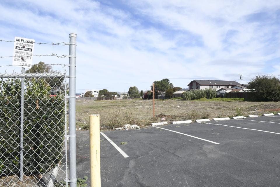 Soil and site cleanup will take place on an empty grass area at 467 East Market Street next year to make way for a new affordable housing building in Salinas, Calif.