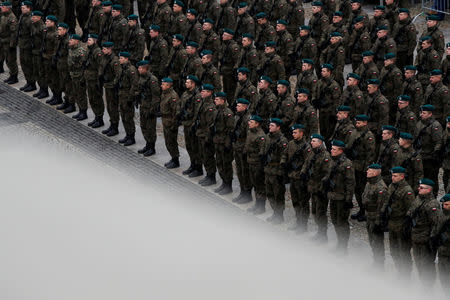 Recruits are sworn in as territorial soldiers in Bialystok, Poland, December 16, 2017. REUTERS/Kacper Pempel/Files