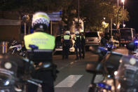 <p>Spanish Policemen inspect a street in Cambrils (Tarragona), northeastern Spain, Aug. 18, 2017, where at least four suspected terrorists have been killed by the police after they knocked down six people with their car at Paseo Maritimo. (Photo: David Gonzalez/EPA/REX/Shutterstock) </p>