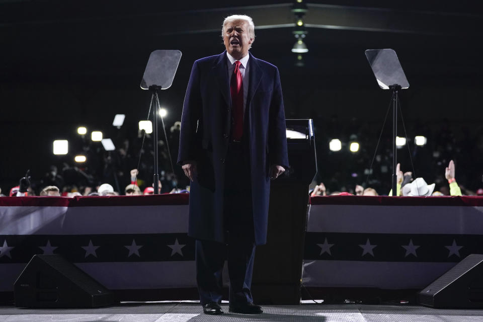 President Donald Trump speaks at a campaign rally for Senate Republican candidates, Sen. Kelly Loeffler, R-Ga., and Sen. David Perdue, R-Ga., at Valdosta Regional Airport, Saturday, Dec. 5, 2020, in Valdosta, Ga. (AP Photo/Evan Vucci)