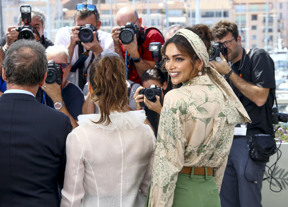 Jury member Deepika Padukone, right, poses with jury president Vincent Lindon, left and Noomi Rapace at the photo call for the jury at the 75th international film festival, Cannes, southern France, Tuesday, May 17, 2022. (Photo by Joel C Ryan/Invision/AP)