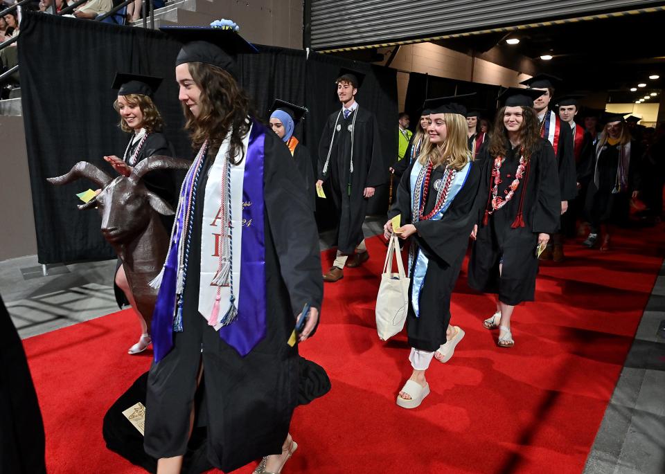 WORCESTER - Many petted Gompei the Goat during the processional to Worcester Polytechnic Institute's Undergraduate Commencement Ceremony at DCU Center on Friday.