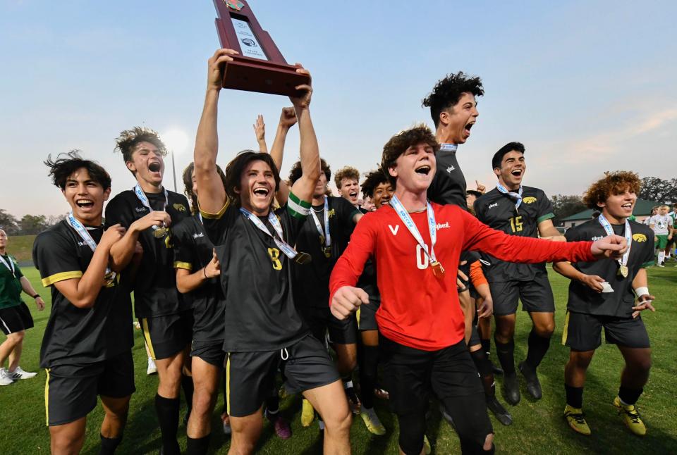 The Viera Hawks hoist the state championship trophy after defeating Fort Myers 4-2 in the FHSAA state soccer championship Saturday, February 25, 2023. Craig Bailey/FLORIDA TODAY via USA TODAY NETWORK