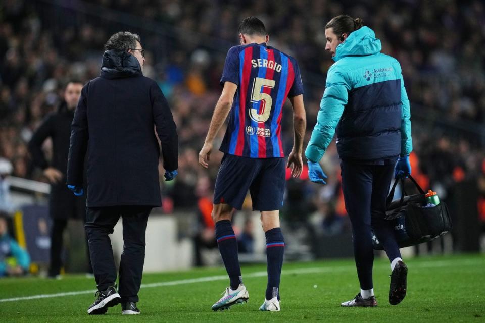 Injured: Busquets will miss the United game with ankle ligament damage (Getty Images)