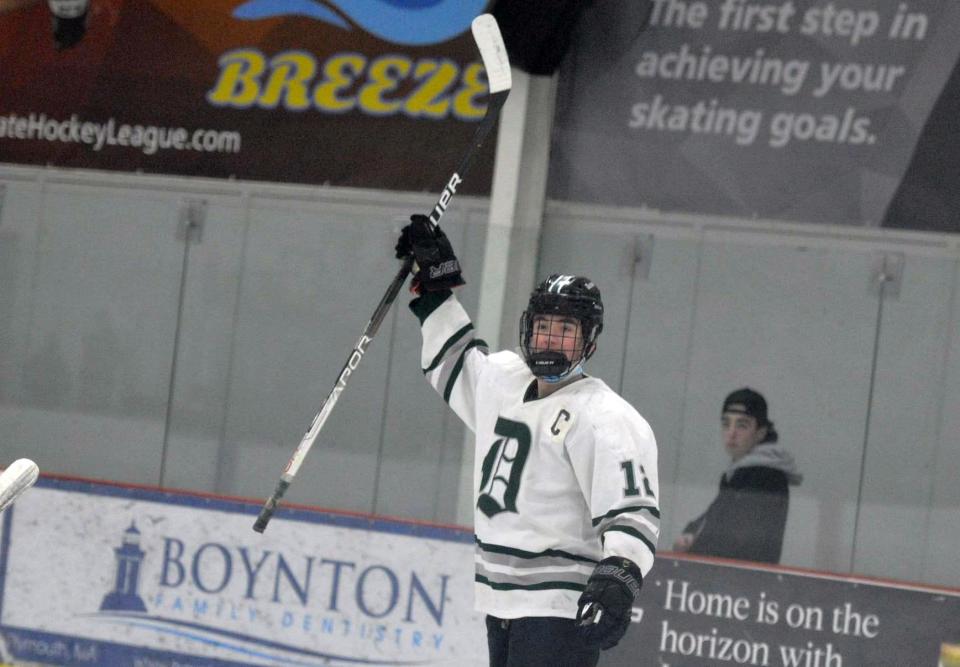 Duxbury's Wyatt Glass celebrates his goal against Hanover during boys hockey at The Bog in Kingston on Monday, Jan. 31, 2022.