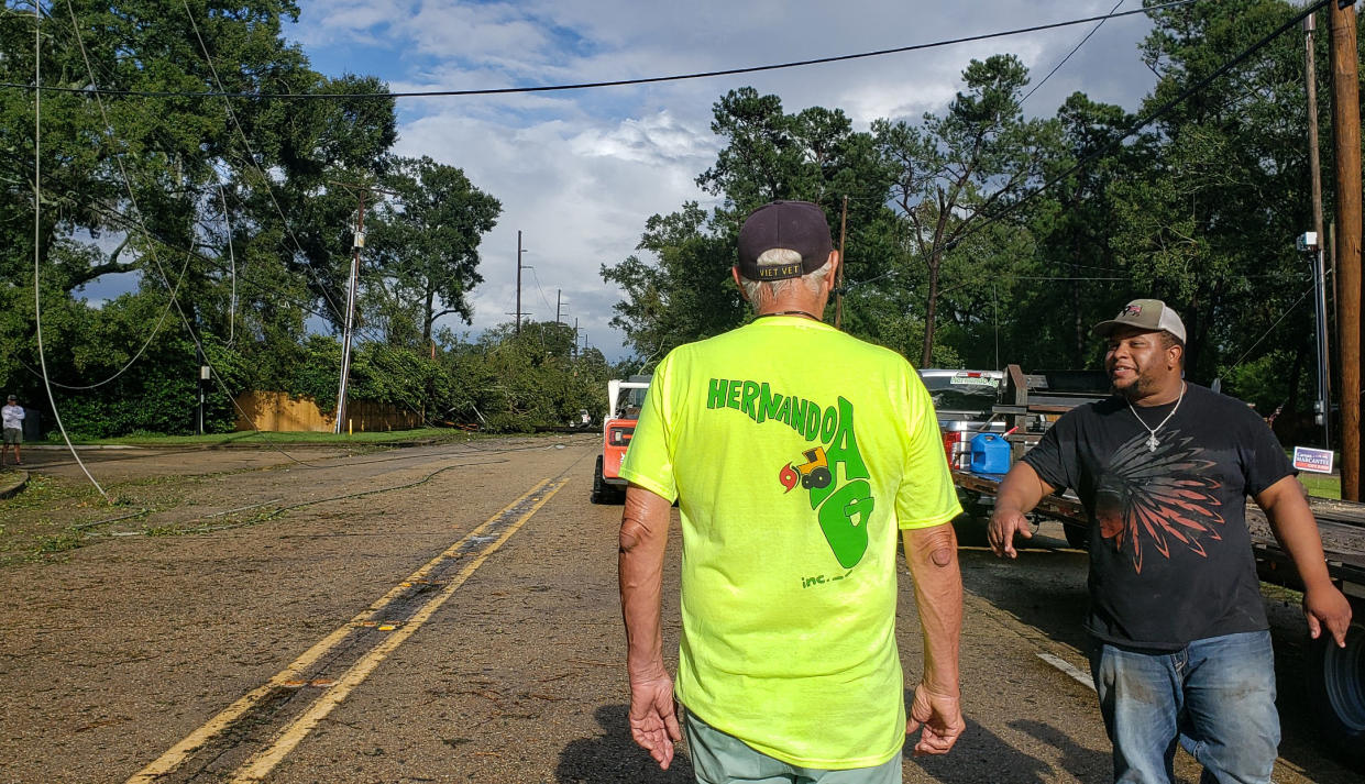 Crew workers with HernandoAg in Baton Rouge, La., cleaning up after Hurricane Ida. (J. Lee Driskell)