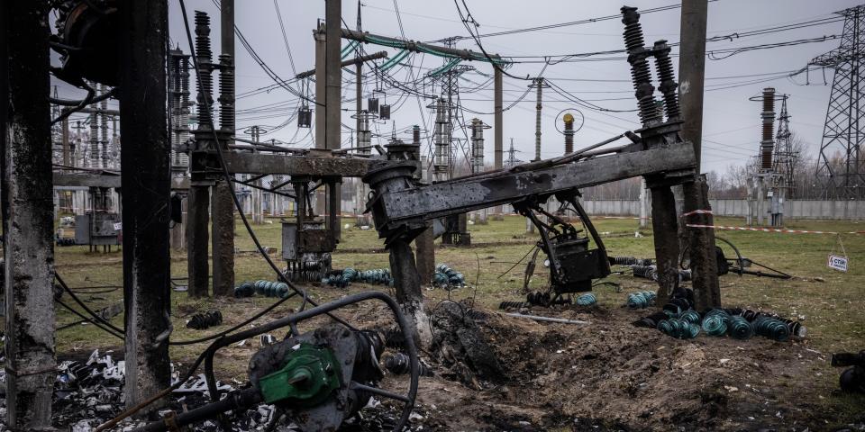 A crater leaves rubble and downed energy infrastructure in Ukraine.