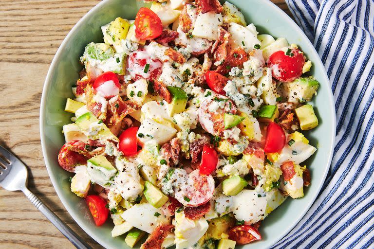 <p>Egg salad is wonderful as is. But add bacon, blue cheese, avocado, and tomatoes, and you've got a lunch that you'll be dreaming about for days. </p><p>Get the <a href="https://www.delish.com/uk/cooking/recipes/a28784272/cobb-egg-salad-recipe/" rel="nofollow noopener" target="_blank" data-ylk="slk:Cobb Egg Salad;elm:context_link;itc:0;sec:content-canvas" class="link ">Cobb Egg Salad</a> recipe.</p>