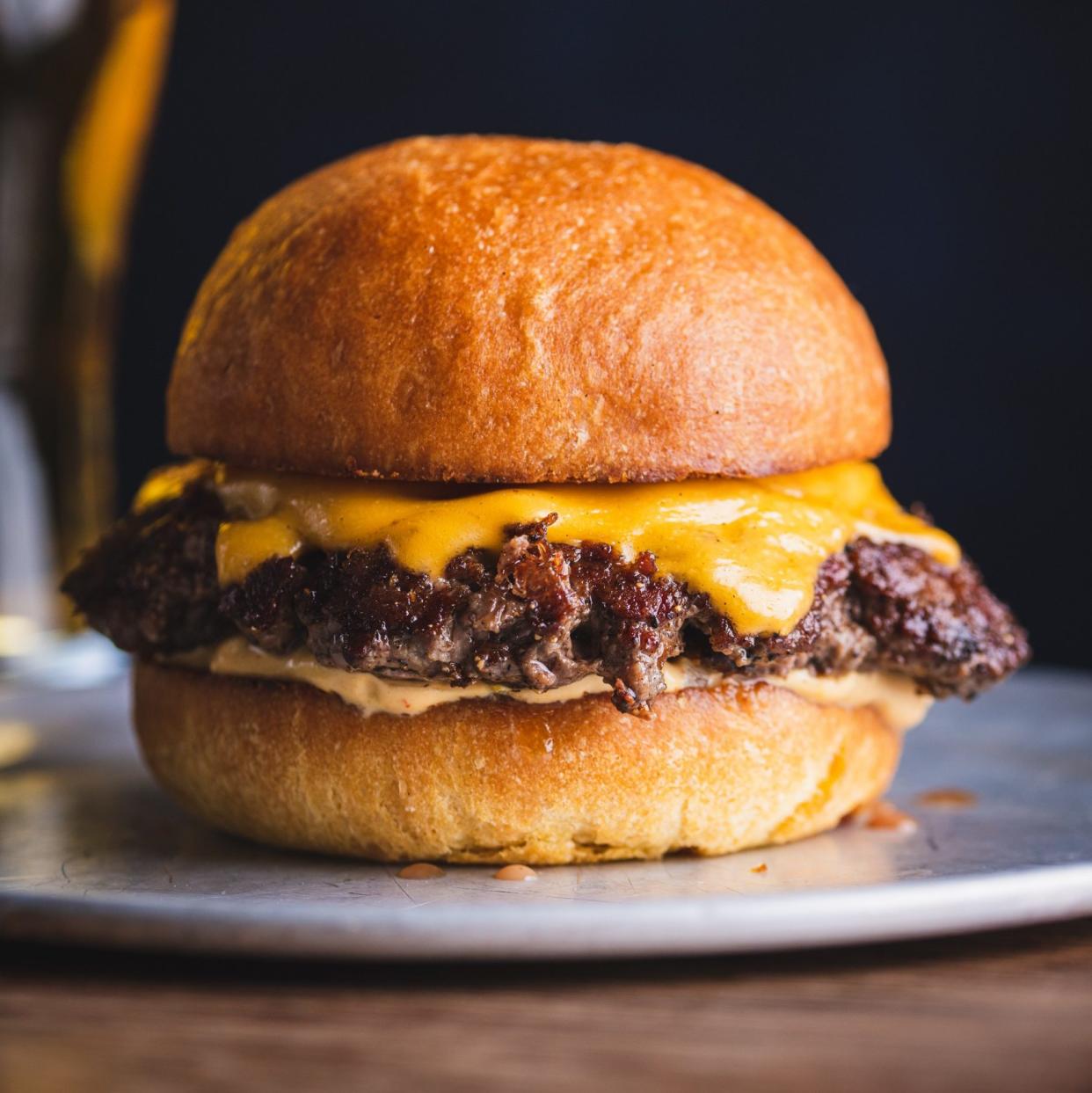 Whole Beast's aged cheeseburger is made with Norfolk wagyu mixed with dry-aged rib cap