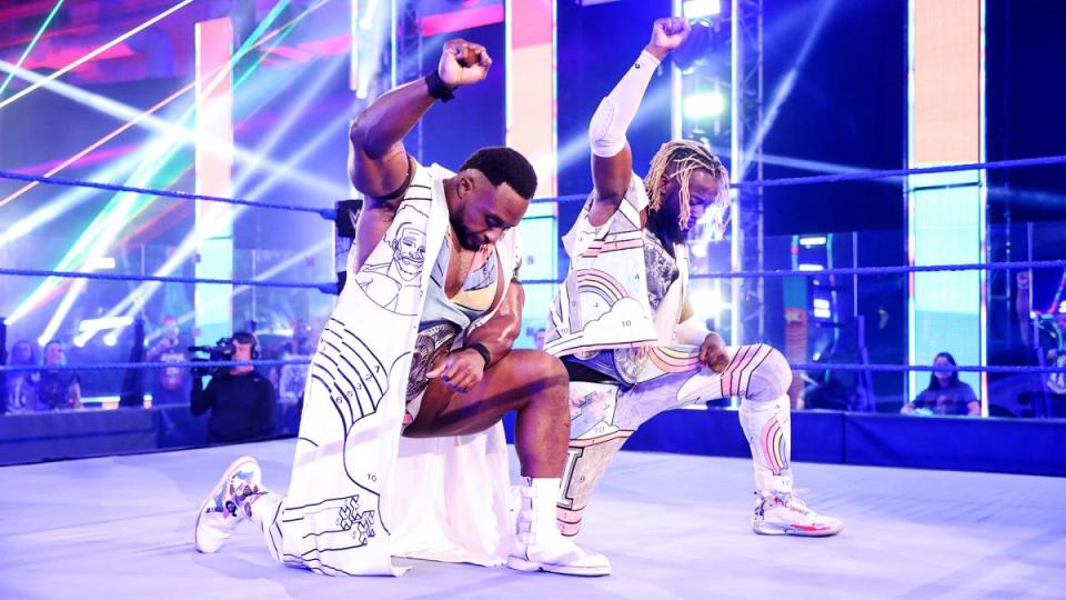 The New Day's Kofi Kingston and Big E take a knee during the opening of Smackdown on June 12, 2020. (Photo courtesy of WWE)