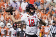 Texas Tech quarterback Tyler Shough (12) looks to pass against Texas during the first half of an NCAA college football game on Saturday, Sept. 25, 2021, in Austin, Texas. (AP Photo/Chuck Burton)