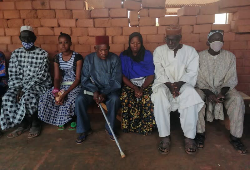 Emir Djibril Diallo, chief negotiator in the talks between the jihadists and the Thiou population is pictured with the displaced peoples of Koumbri during a visit at the displaced camp of Ouahigouya