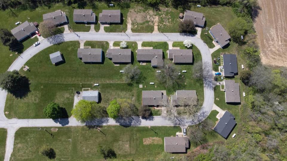 This drone photo shows a loop lined with small frame homes that were built for U.S. military personnel who manned Belleville Air Force Station, which opened in 1951 on Turkey Hill. For the past 40 years, they’ve housed adults with developmental disabilities.