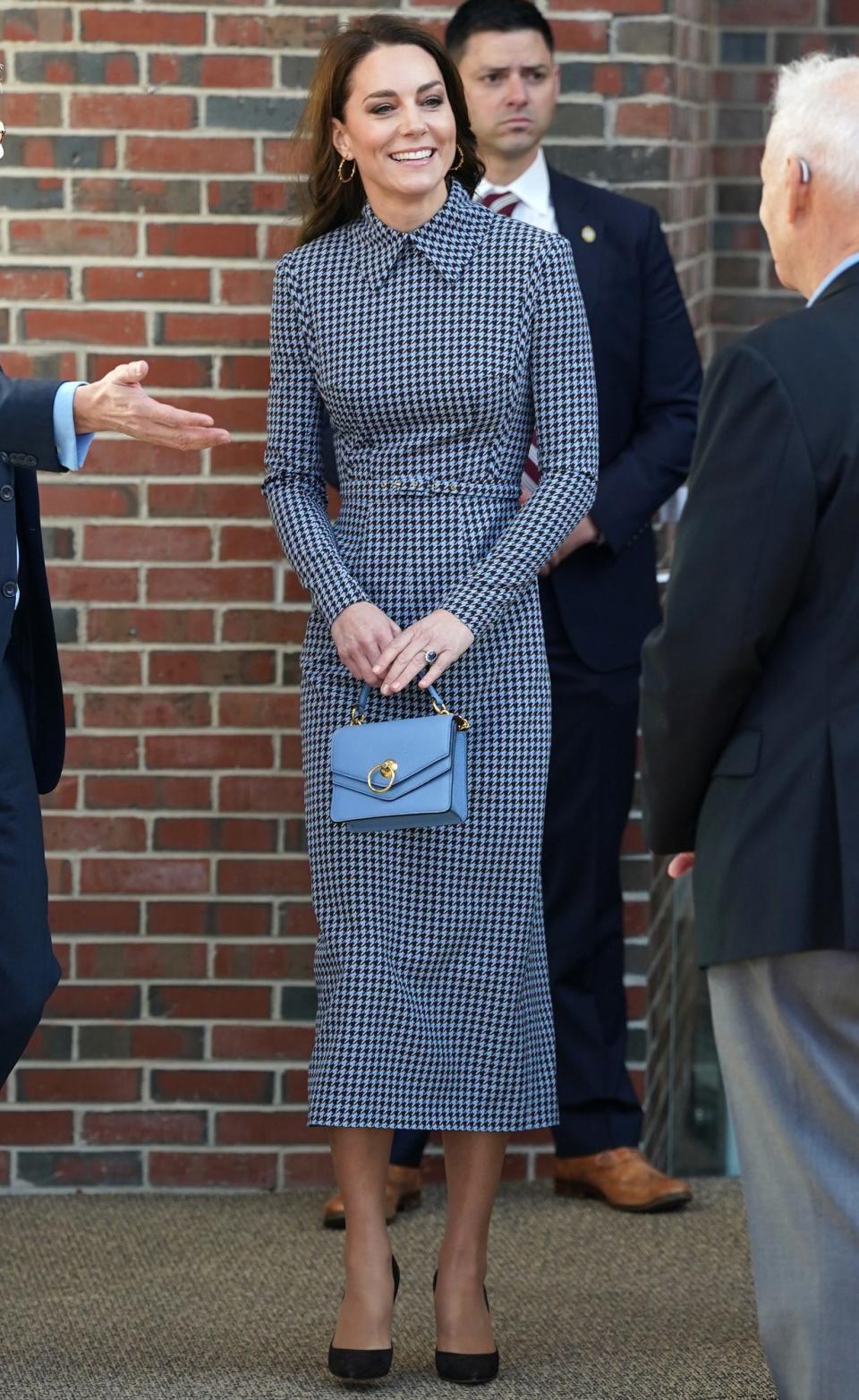 <p>Princess Kate made her <a href="https://people.com/royals/kate-middleton-visits-harvard-university-solo-boston-trip/" rel="nofollow noopener" target="_blank" data-ylk="slk:first solo outing of the tour at Harvard University;elm:context_link;itc:0;sec:content-canvas" class="link ">first solo outing of the tour at Harvard University</a> on Friday, where she visited the Center on the Developing Child. She looked polished in a the Emilia Wickstead Miles Houndstooth midi dress with long sleeves paired with a light blue Mulberry bag and heels.</p>