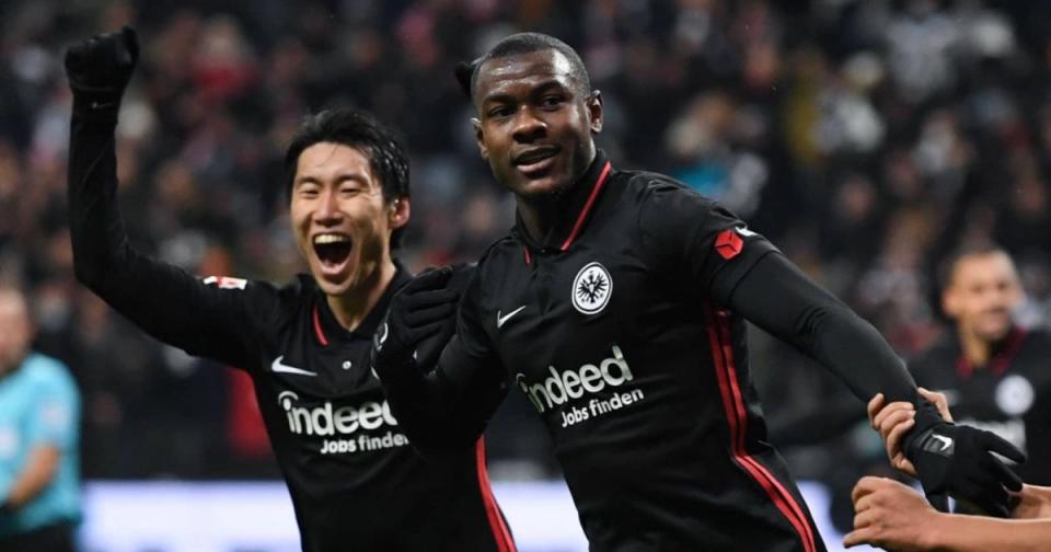 Eintracht Frankfurt players Evan Ndicka and Daichi Kamata Credit: Alamy