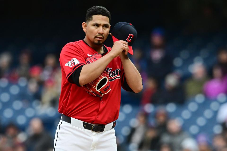 Apr 24, 2024; Cleveland, Ohio, USA; Cleveland Guardians starting pitcher Carlos Carrasco (59) adjust his hat during the fourth inning against the Boston Red Sox at Progressive Field. Mandatory Credit: Ken Blaze-USA TODAY Sports