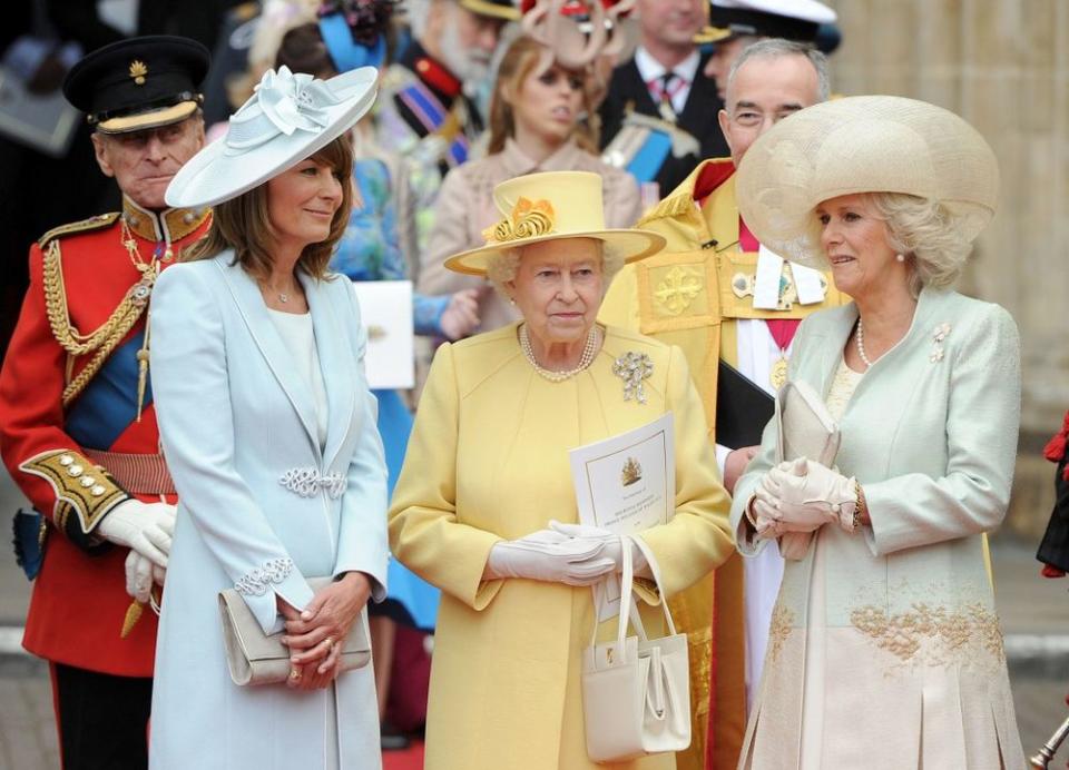 Carole Middleton (in Catherine Walker & Co.) with Queen Elizabeth and Camilla, Duchess of Cornwall, at the 2011 wedding of William and Kate.