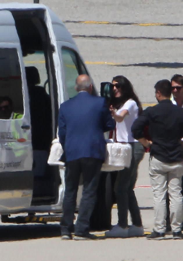 Amal was on hand to pop the other bub in the waiting van. Source: Australscope