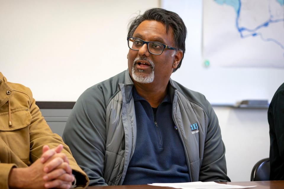 Sanjeev King, director of Springfield Utility Board’s Electric Service Center, speaks during a press conference as winter storm recovery continues Friday, Jan. 19, 2024, in Springfield, Ore.