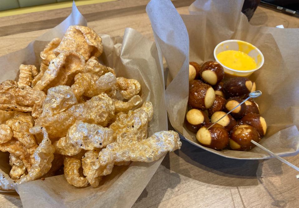 Crispy Fresh Pork Skins and Pretzel Bites are two of the new menu items being offered by Eddy's at Montgomery Whitewater.