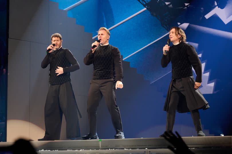 Howard Donald, Gary Barlow, and Mark Owen