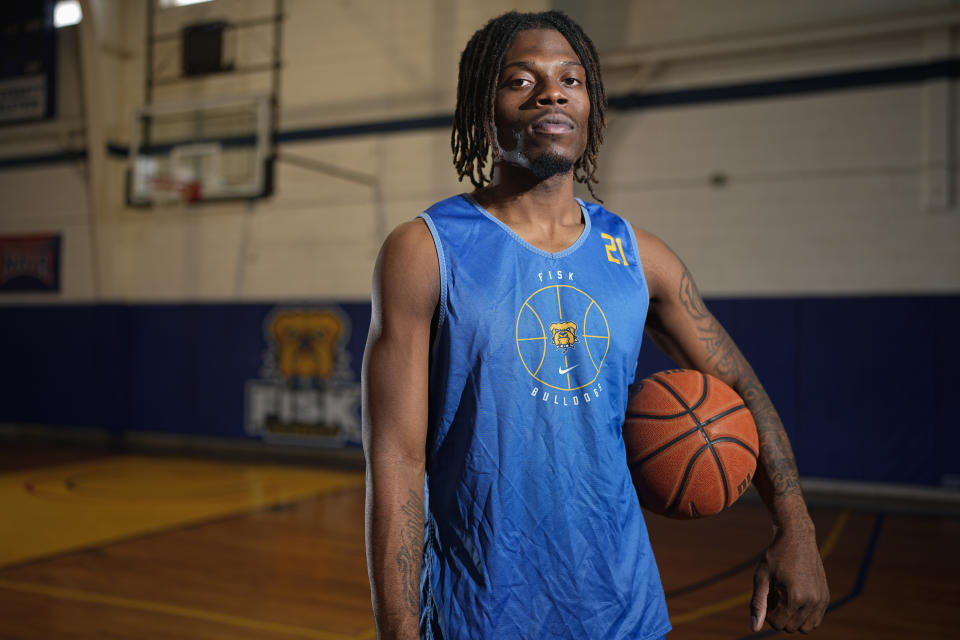 Fisk University basketball player Jeremiah Armstead poses for a portrait Wednesday, March 6, 2024, in Nashville, Tenn. The formerly homeless Armstead will receive the U.S. Basketball Writers Association 2024 Perry Wallace Most Courageous award at the NCAA Final Four basketball tournament. (AP Photo/George Walker IV)