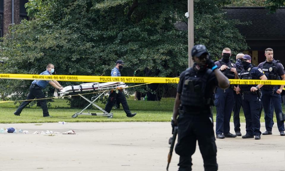 <div class="inline-image__caption"><p>Paramedics push a stretcher after shot rang out during the demonstration by NFAC.</p></div> <div class="inline-image__credit">Bryan Woolston/Reuters</div>