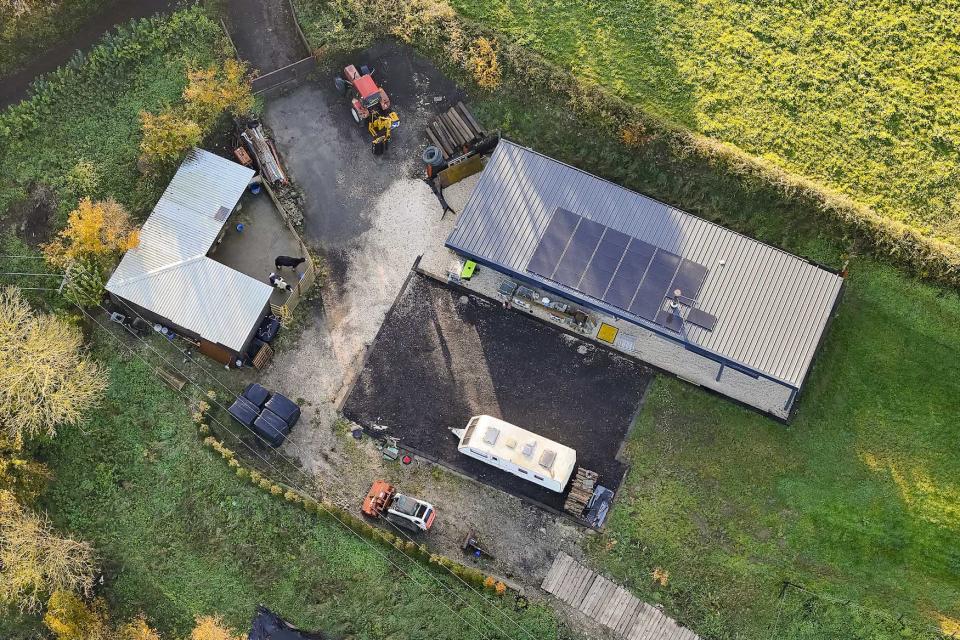 BNPS.co.uk (01202 558833)
Pic: Graham Hunt/BNPS

EMBARGO - IMAGES NOT TO BE USED ONLINE BEFORE 9AM TUESDAY (05/12/23) - EMBARGO

Pictured: Aerial view of a house on Winters Hill Lane at West Compton near Shepton Mallet in Somerset which was build without planning permission.

A well-respected businessman is facing the daunting prospect of demolishing his new home after illegally building it during lockdown.

Tony Harvey failed to obtain planning permission when he self-built the contemporary family home near Glastonbury, Somerset.

The controversial property - worth about Â£400,000 - sits on agricultural land once owned by his late grandfather in the village of West Compton.