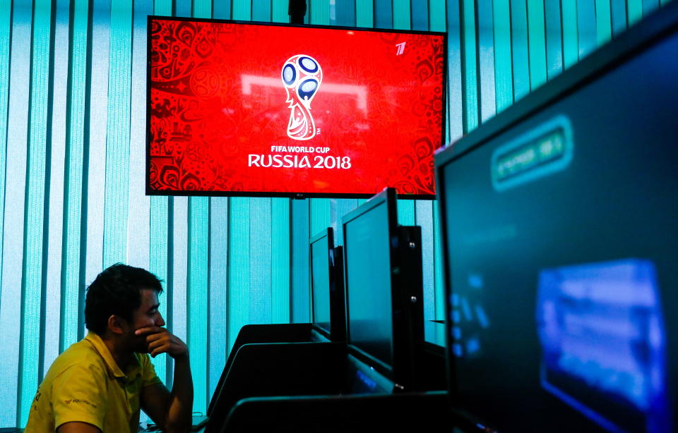 A computer screen shows the 2018 FIFA World Cup emblem in a Moscow branch of Liga Stavok, one of the leading Russian betting companies. (Getty Images)