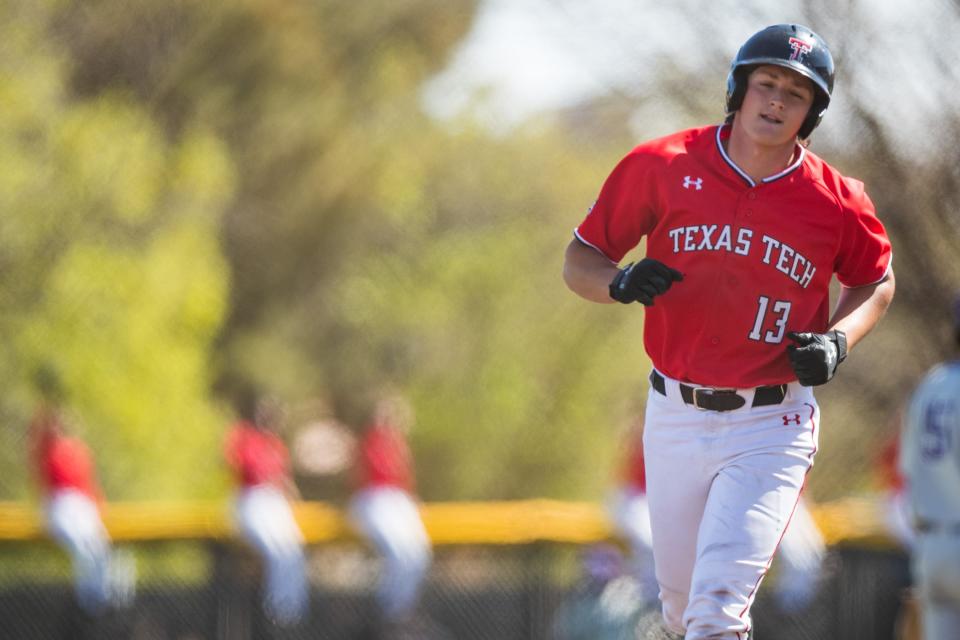 Texas Tech's Gavin Kash (13) rounds the bases after hitting a home run last year in a Red Raiders' home game against TCU. Tech and TCU play a three-game series this weekend in Fort Worth.