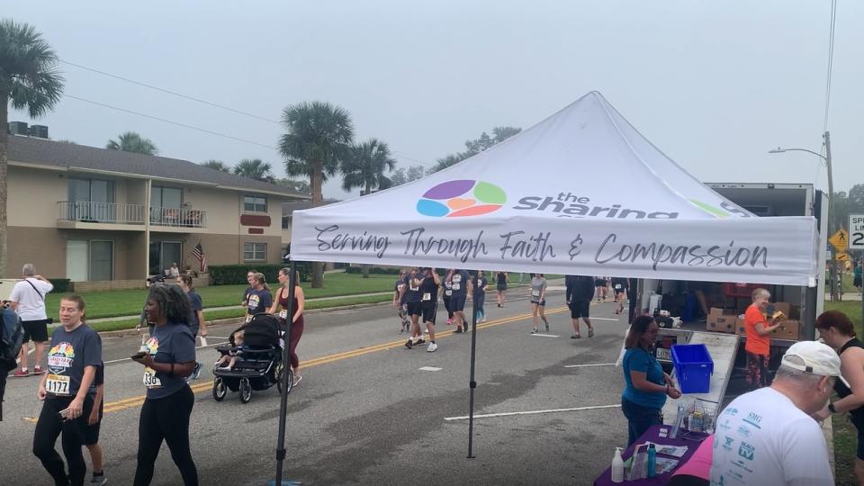 People donated canned goods and participated in the 5K Thursday morning.